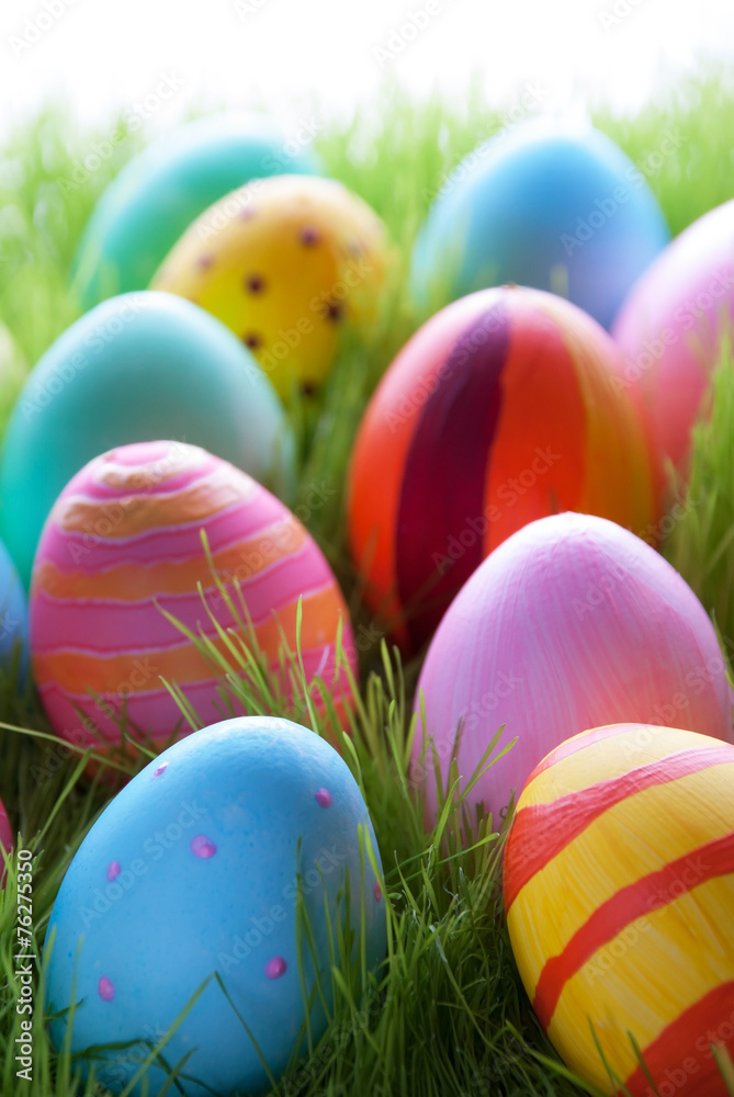 Many Colorful Easter Eggs On Green Grass