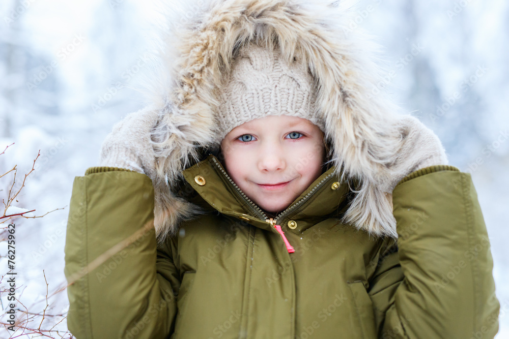 Little girl outdoors on winter Little girl outdoors on winter