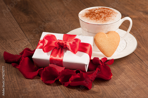 Closeup image of present and cupcoffee photo