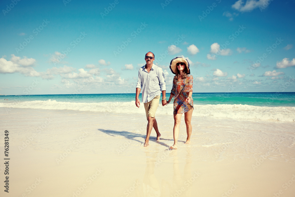 Loving couple relaxing on beach