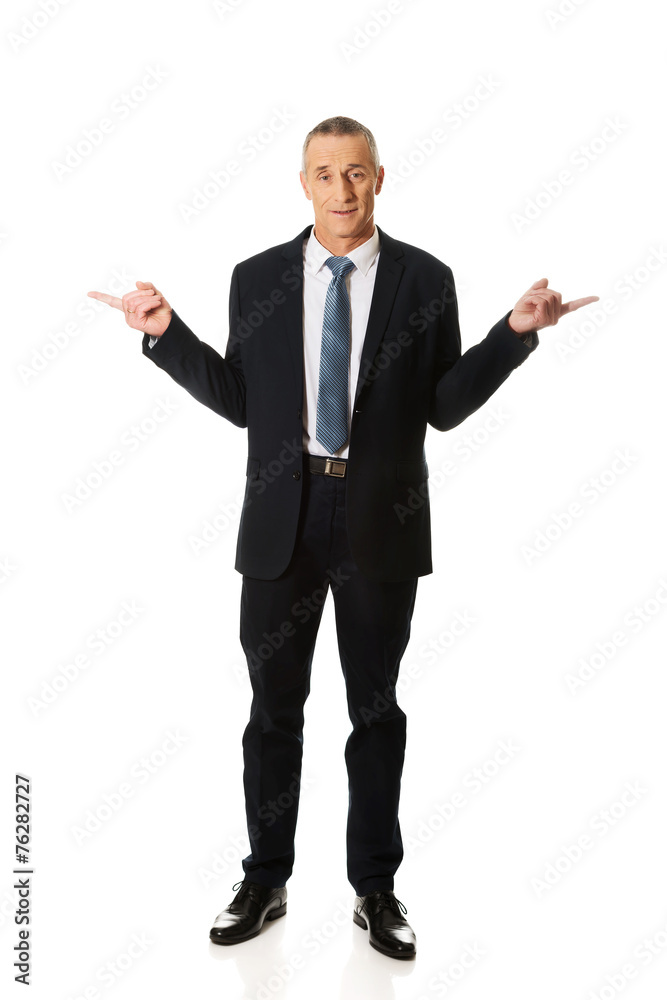 Full length businessman with hands on both sides Full length businessman with hands on both sides