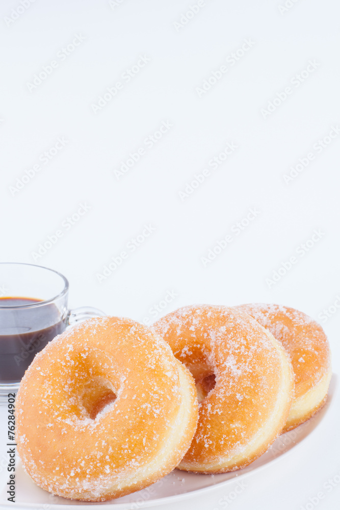 Delicious Sugar Ring Donut with a White paper Background Delicious Sugar Ring Donut with a White paper Background