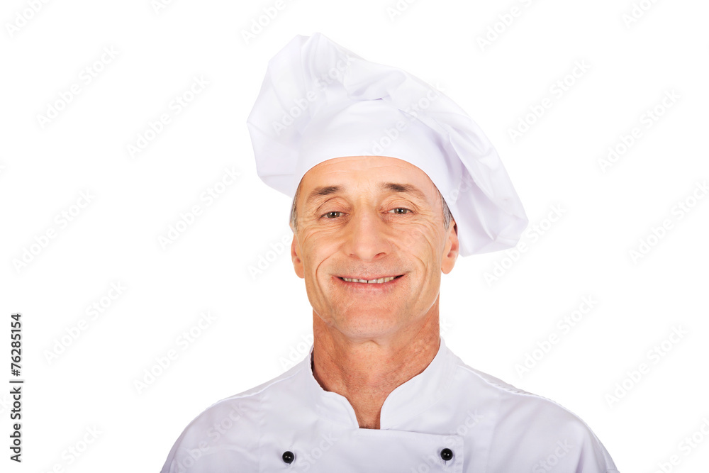 Professional chef in white uniform and hat