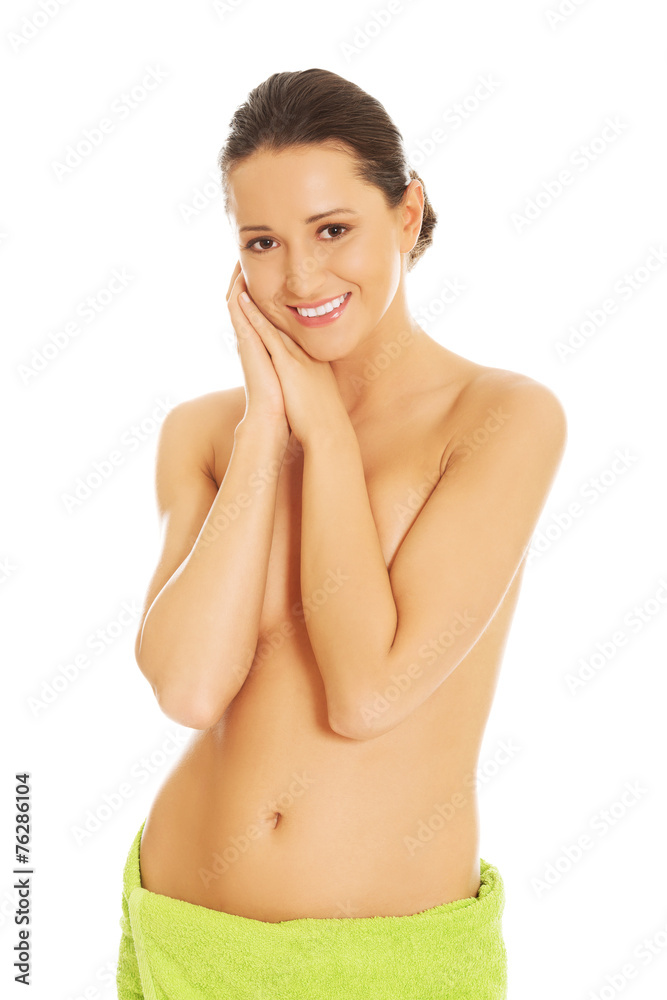 Beautiful happy woman wrapped in towel Beautiful happy woman wrapped in towel