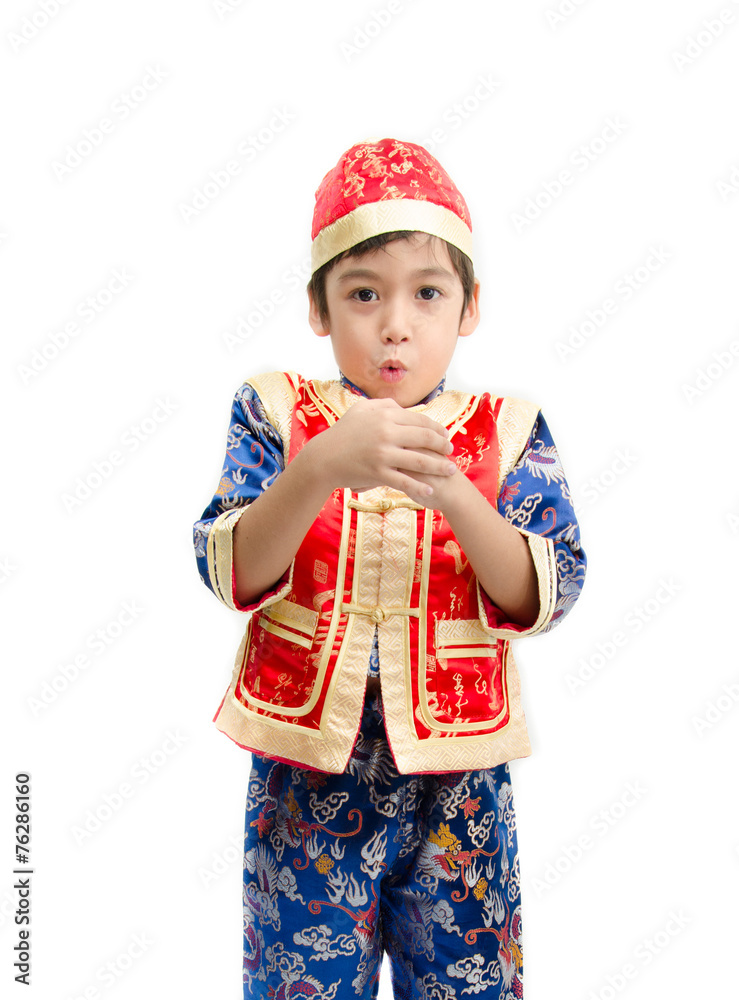 Little boy in dress for chinese new year on white background Little boy in dress for chinese new year on white background