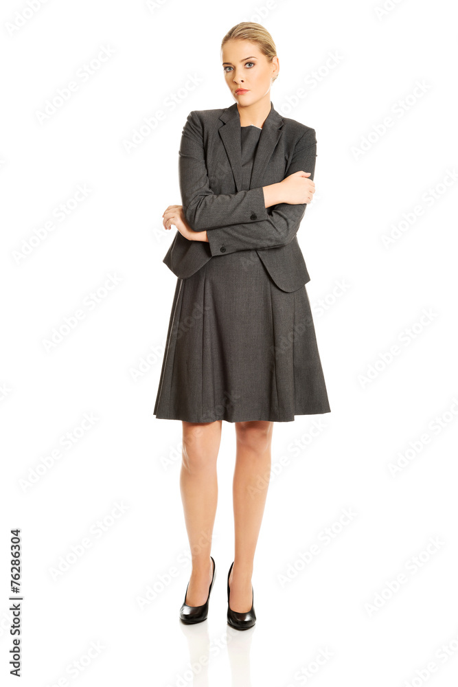 Businesswoman standing in confident pose Businesswoman standing in confident pose