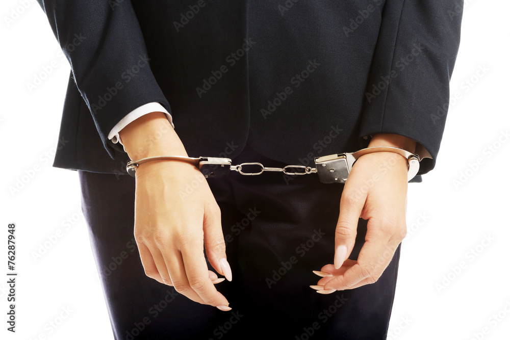 Businesswoman hands with handcuffs