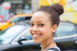 Beautiful Mixed-Race Young Woman in the City, Smiling Portrait