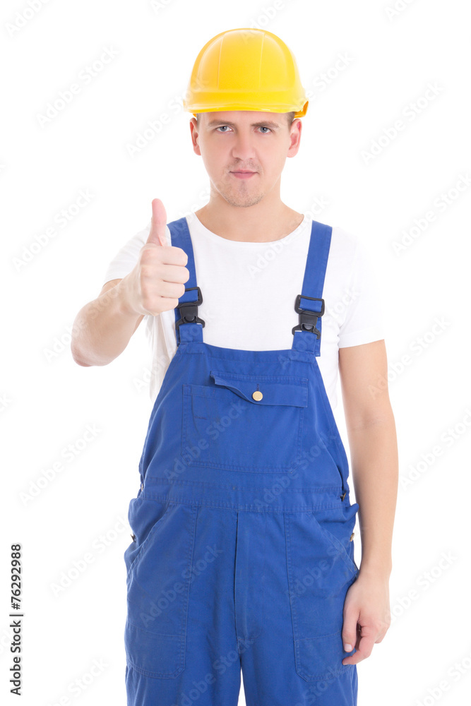 young handsome man in blue builder uniform thumbs up isolated on young handsome man in blue builder uniform thumbs up isolated on