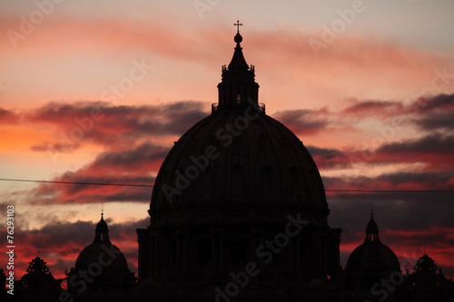 Canvas Print Sunset over the dome of Saint Peter's Basilica in Vatican City.