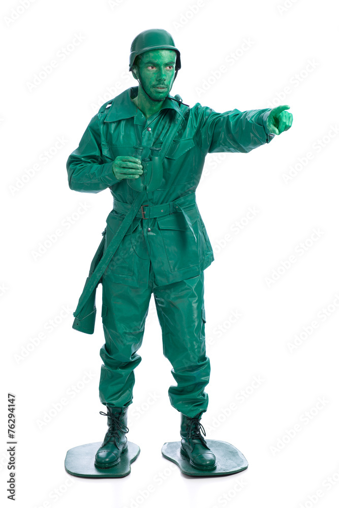 Man on a green toy soldier costume Man on a green toy soldier costume