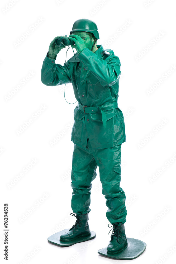 Man on a green toy soldier costume Man on a green toy soldier costume