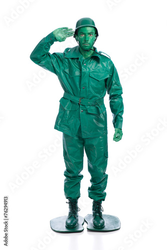 Man on a green toy soldier costume © homydesign
