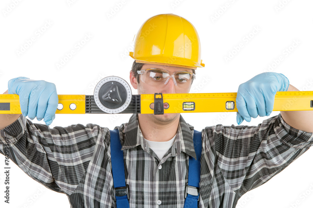 a young worker with a level a young worker with a level
