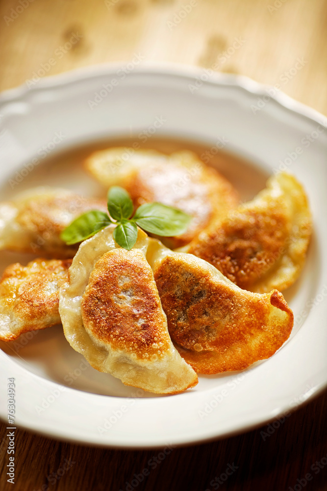 Fried dumplings filled with mushrooms and cabbage