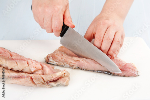 cutting cod fillets