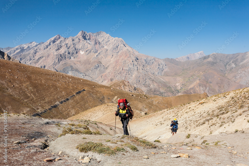 Hikers in high mountains.