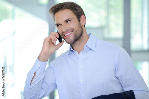 Smiling businessman having phone call - Successful businessman