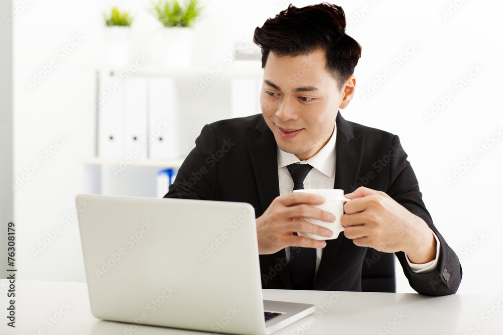 Young business man working in the  office