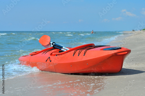 kayak on the beach © chirnoagarazvan
