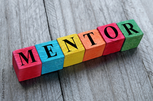 word mentor on colorful wooden cubes photo