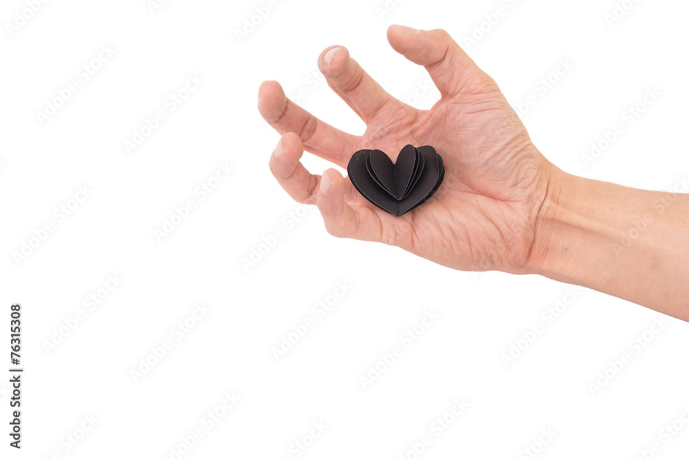 Valentines Day Black Heart paper on Hand with White Isolated Bac Valentines Day Black Heart paper on Hand with White Isolated Bac