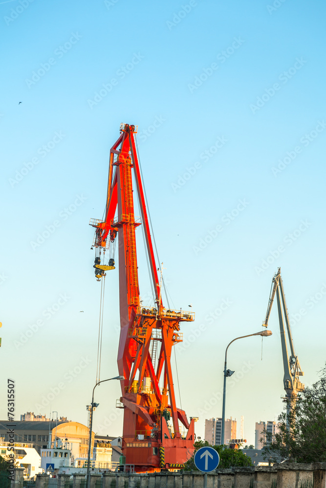 Industrial cargo cranes in the dock Industrial cargo cranes in the dock