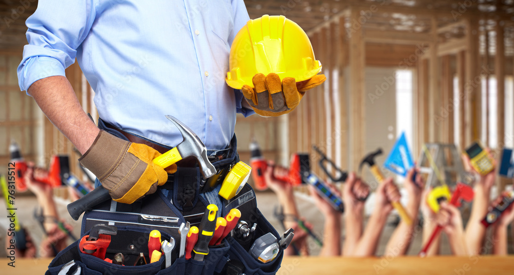Construction worker with hammer and tools. Construction worker with hammer and tools.