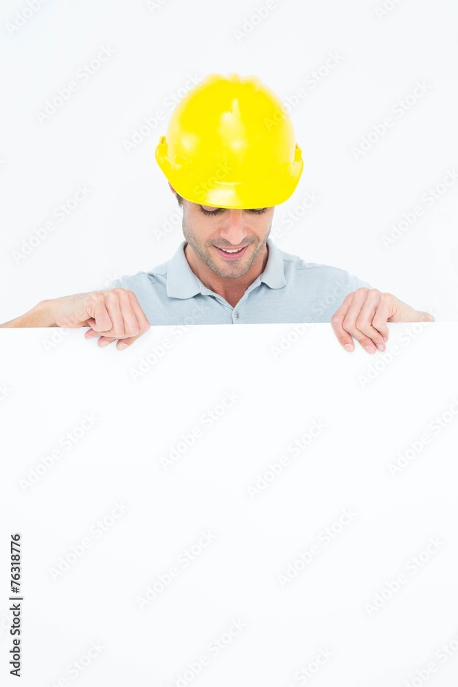 Architect looking at bill board Architect looking at bill board