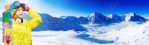 Skiing, freeski, panorama - girl enjoying ski vacation