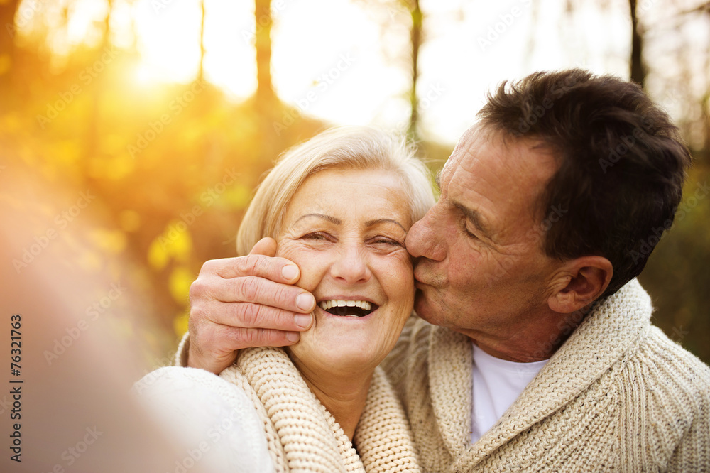 Fototapeta premium Active seniors taking selfies of themselves