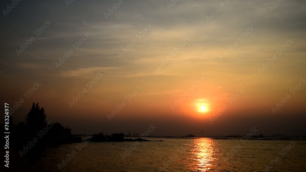Bird flying with sunset sky at sea, Sriracha, Chonburi, Thailand Bird flying with sunset sky at sea, Sriracha, Chonburi, Thailand