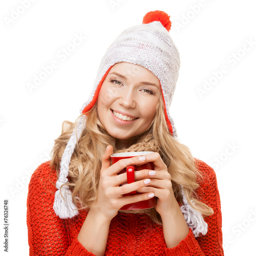 Beautiful blonde woman with an aromatic hot coffee in hands. Iso