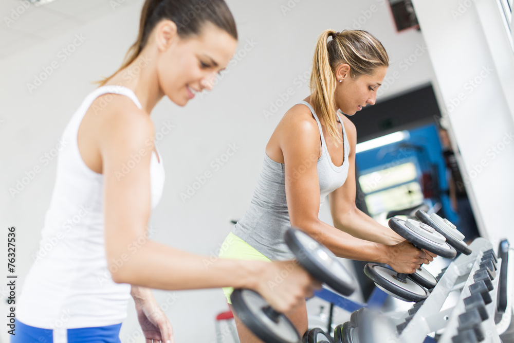Young woman training in the gym Young woman training in the gym