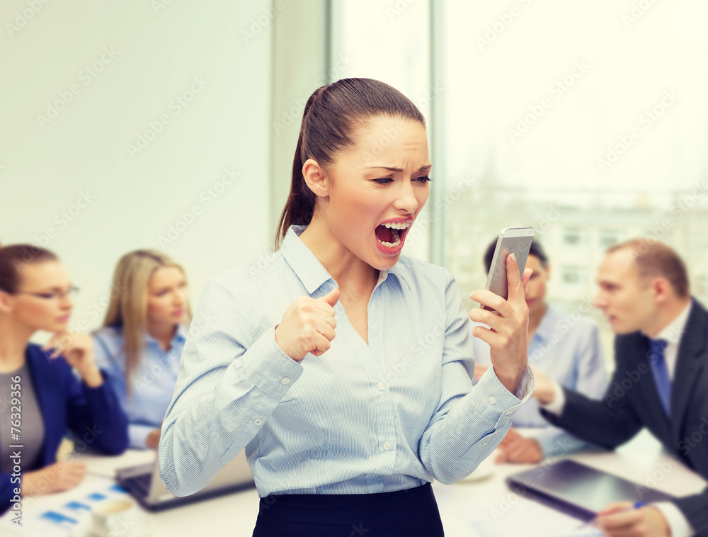 screaming businesswoman with smartphone screaming businesswoman with smartphone