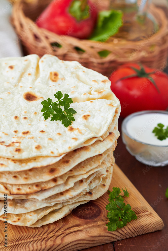 Flour tortillas on a cutting board