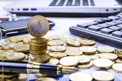 Composition of money, pen, bank card, calculator and financial c photo