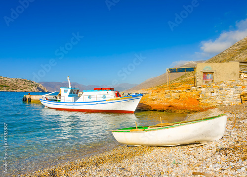 Old fishing boats by the sea in Amorgos island in Greece