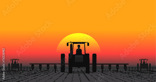 tractor processes the earth a rural landscape