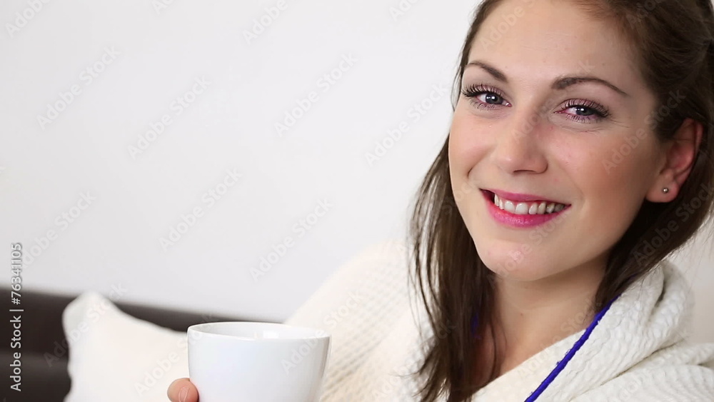 Attractive woman smelling her coffee cup Attractive woman smelling her coffee cup