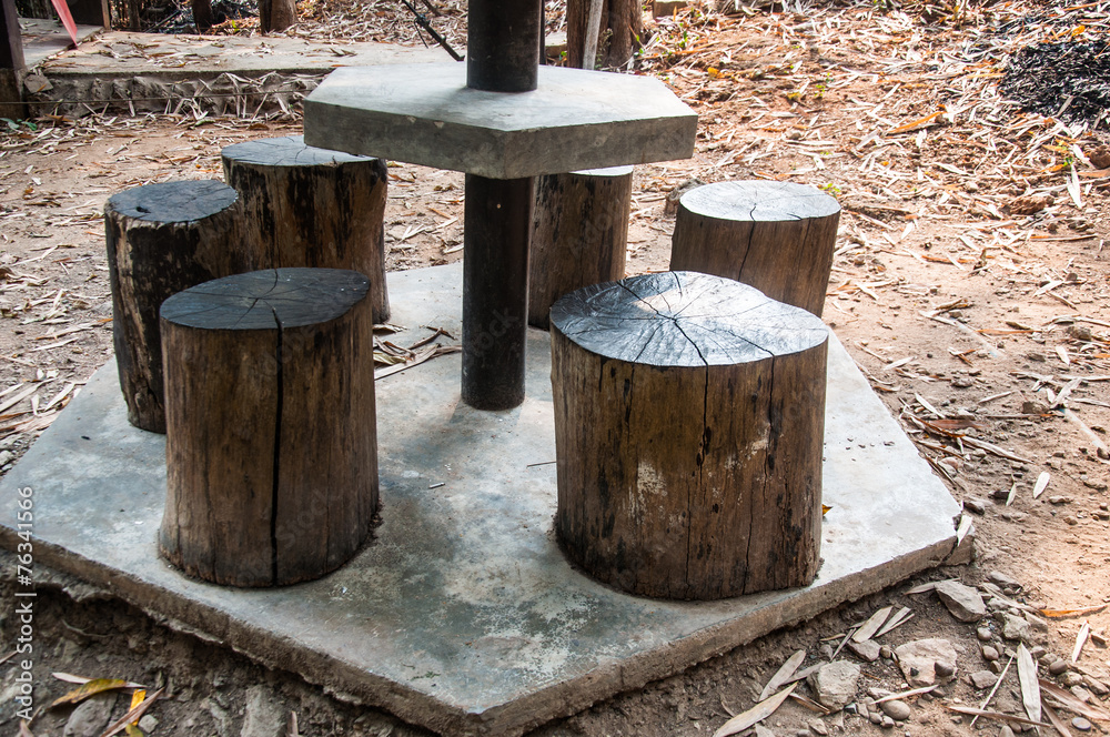 Stumps seats in the garden made from wooden log Stumps seats in the garden made from wooden log