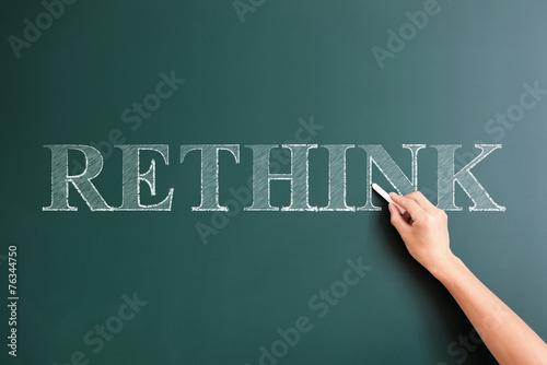 rethink written on blackboard photo