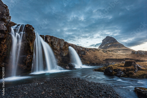 kirkjufellsfoss  waterfalls and kirkjufell mountain in the morni
