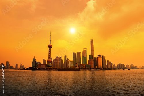 modern city at sunrise,Shanghai skyline © snvv