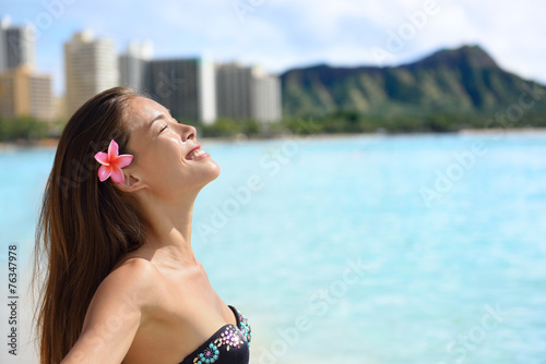 Enjoyment - beach woman on Waikiki, Oahu, Hawaii