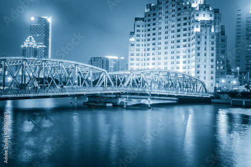 Shanghai Waibaidu bridge panorama at night with colorful light o