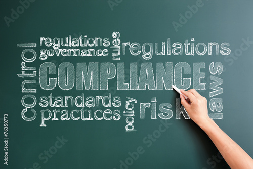 compliance written on blackboard