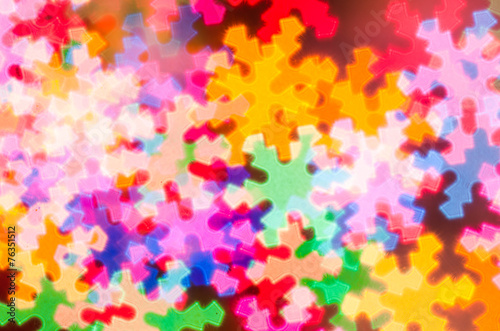 Blurred bokeh snowflakes background