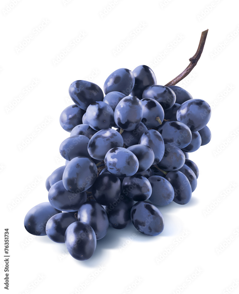 Fototapeta premium Diagonal dry blue grapes bunch isolated on white