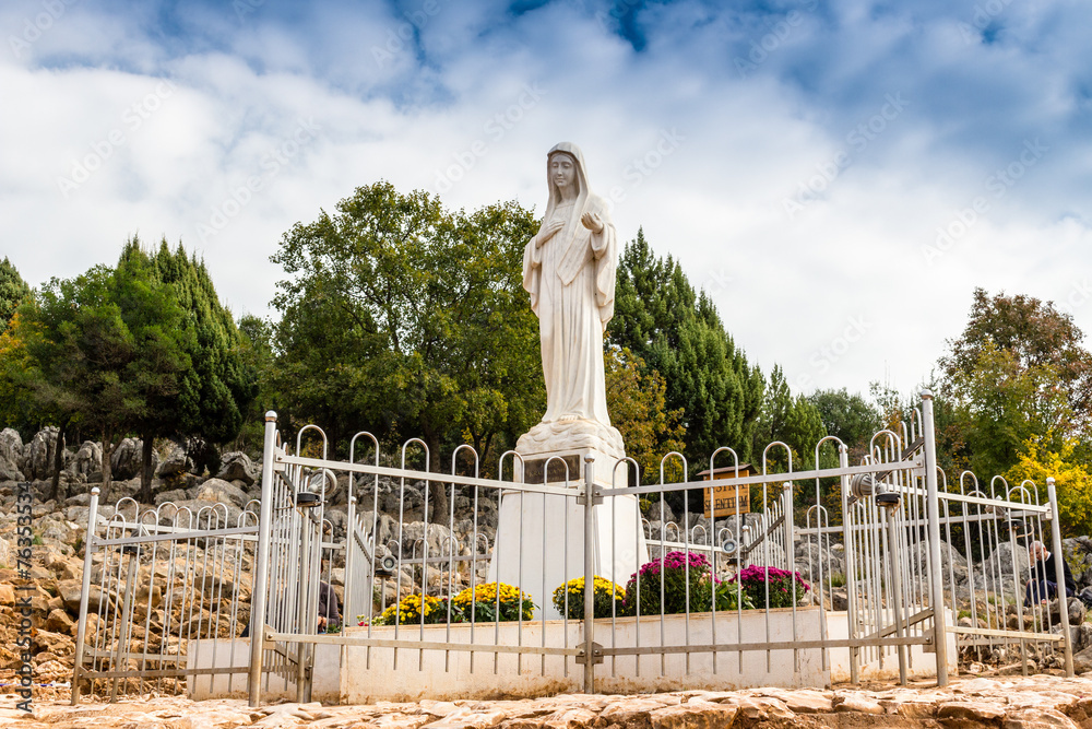 Blessed Virgin Mary Statue on Apparition hill - obrazy, fototapety, plakaty 